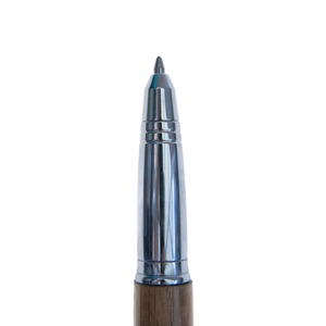 Beautiful handcrafted Burgundy Wine Barrell ballpoint pen made by Wig and Pens. Silver nib, tip and clip and a wood body. Picture of the tip