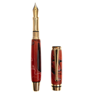 Crimson Flame handcrafted resin fountain pen made by Wig and Pens. red, white, black and hints of orange throughout the body of the pen that emulates the swirling colours of a beautiful flame. Adorned with a gold pen clip, tip and hardware. Also available as a ball point pen. Image of pen with lid off.