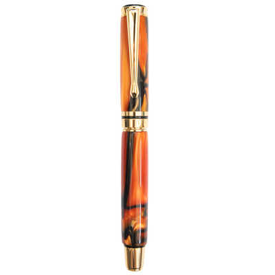 Molten Lave handcrafted resin fountain pen made by Wig and Pens. Swirls of red, orange, black and hints of gold throughout the body of the pen with gold pen clip, tip and hardware. Also available as a ball point pen. Image of pen with lid on